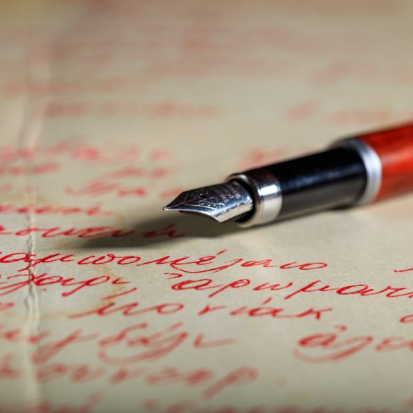 Ink pen on a handwritten letter
